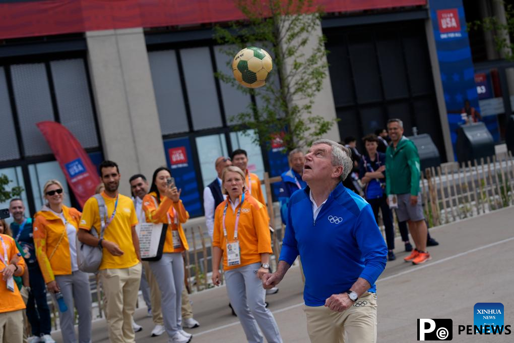 IOC chief Bach tours Olympic Village ahead of Paris 2024
