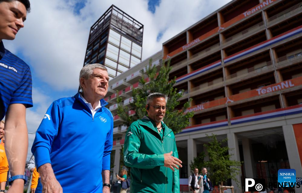 IOC chief Bach tours Olympic Village ahead of Paris 2024