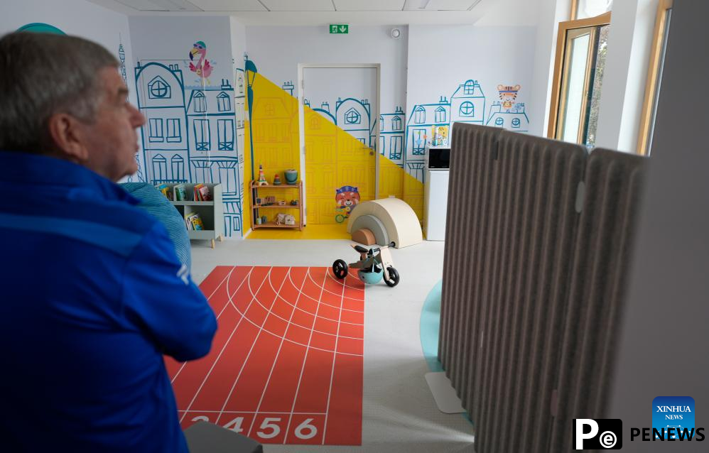IOC chief Bach tours Olympic Village ahead of Paris 2024
