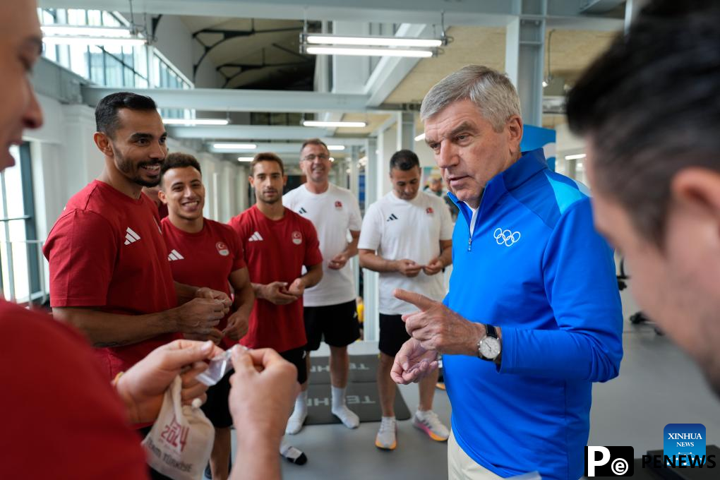 IOC chief Bach tours Olympic Village ahead of Paris 2024