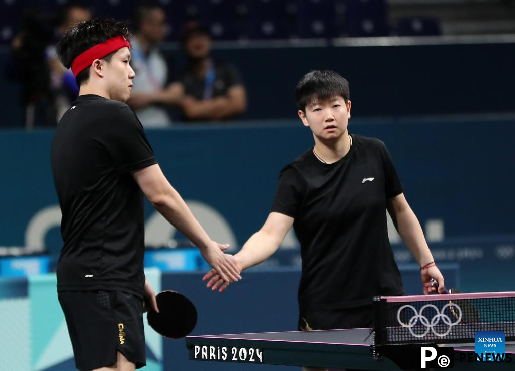 Chinese national table tennis team train for Paris 2024
