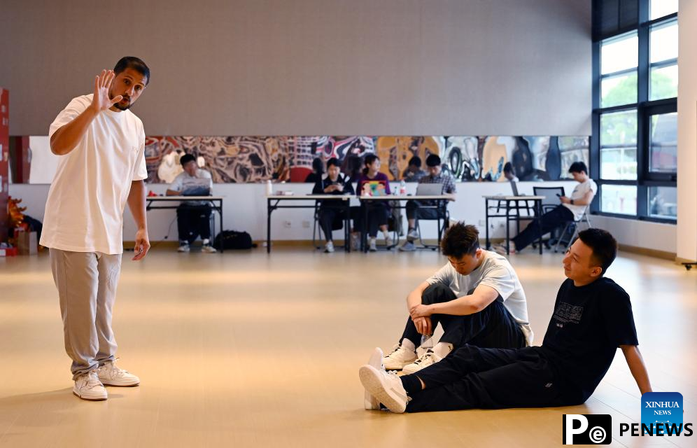 Pic story: French coach leads Chinese breakdancers to Olympic stage