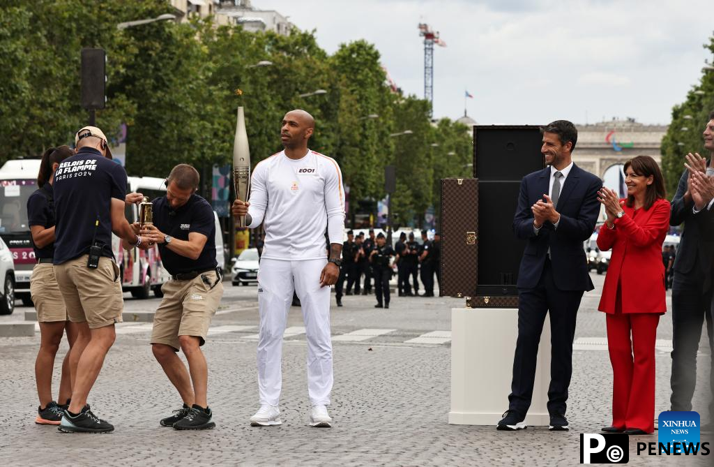 In pics: Olympic Games Paris 2024 Torch Relay