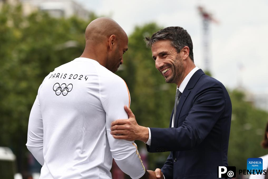 In pics: Olympic Games Paris 2024 Torch Relay