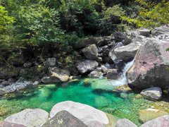 Tourists enjoy the crystal clear 