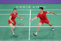 Chinese shuttlers dominate mixed doubles, hosts' Marchand bags 4th swimming gold