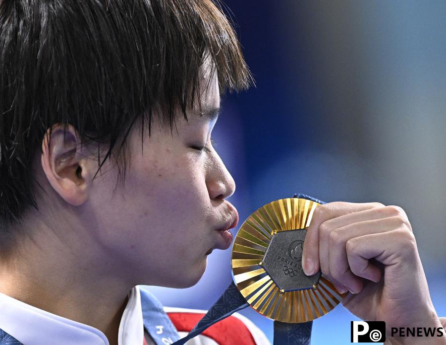 Day 11: Sensational Quan retains diving title, multiple new records created