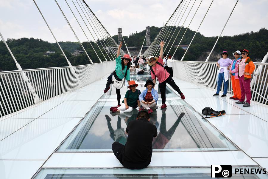 Central Chinese resort city sees record high inbound, outbound visitors