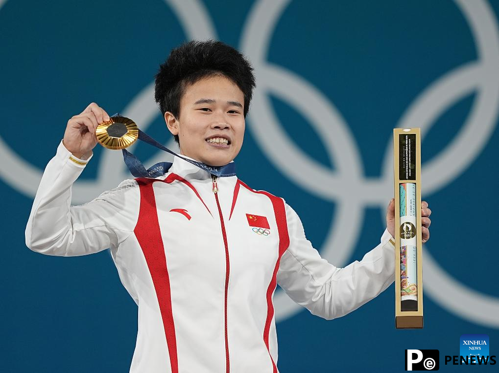 Chinese weightlifters Hou, Li retain gold at Paris 2024
