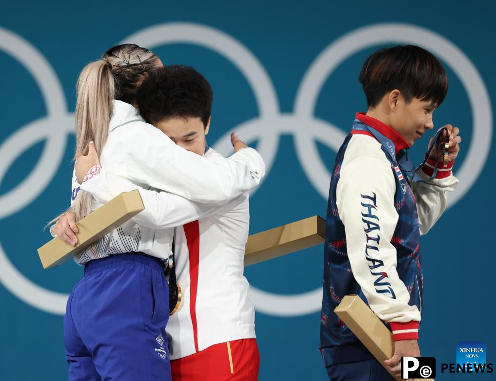 Chinese weightlifters Hou, Li retain gold at Paris 2024