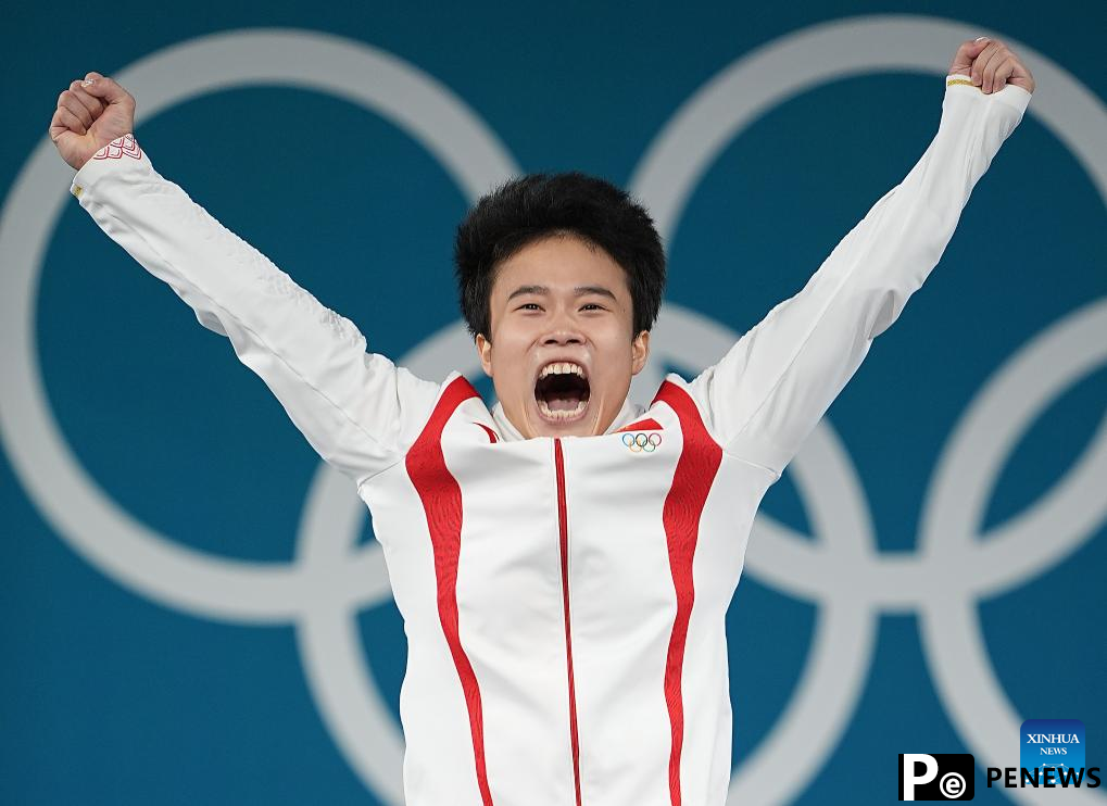 Chinese weightlifters Hou, Li retain gold at Paris 2024
