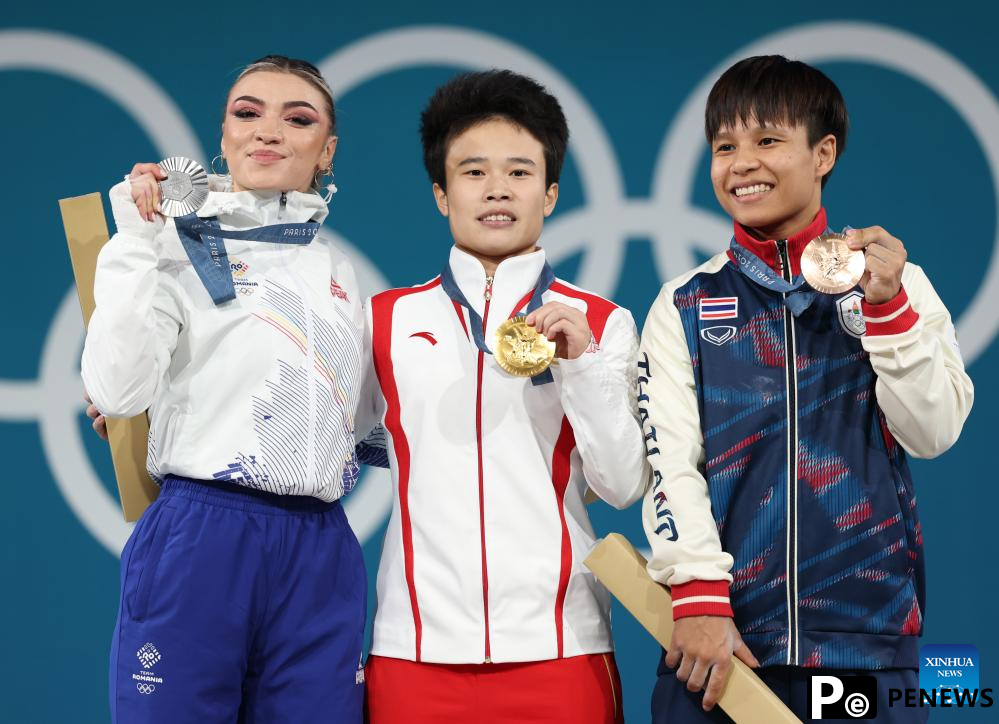 Chinese weightlifters Hou, Li retain gold at Paris 2024