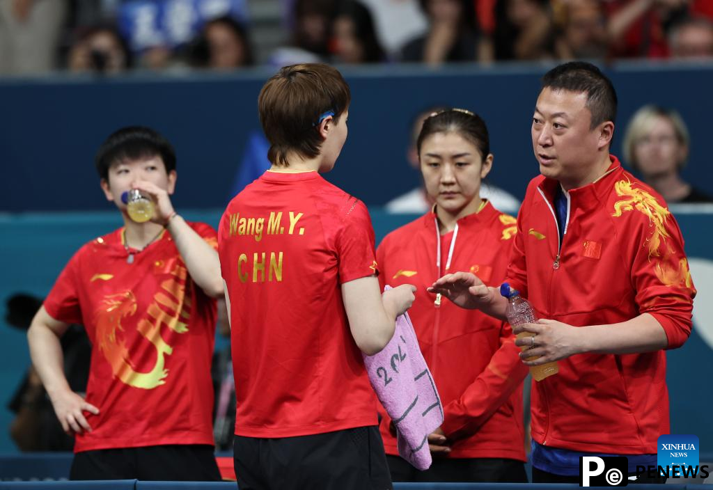Chinese paddlers move into men