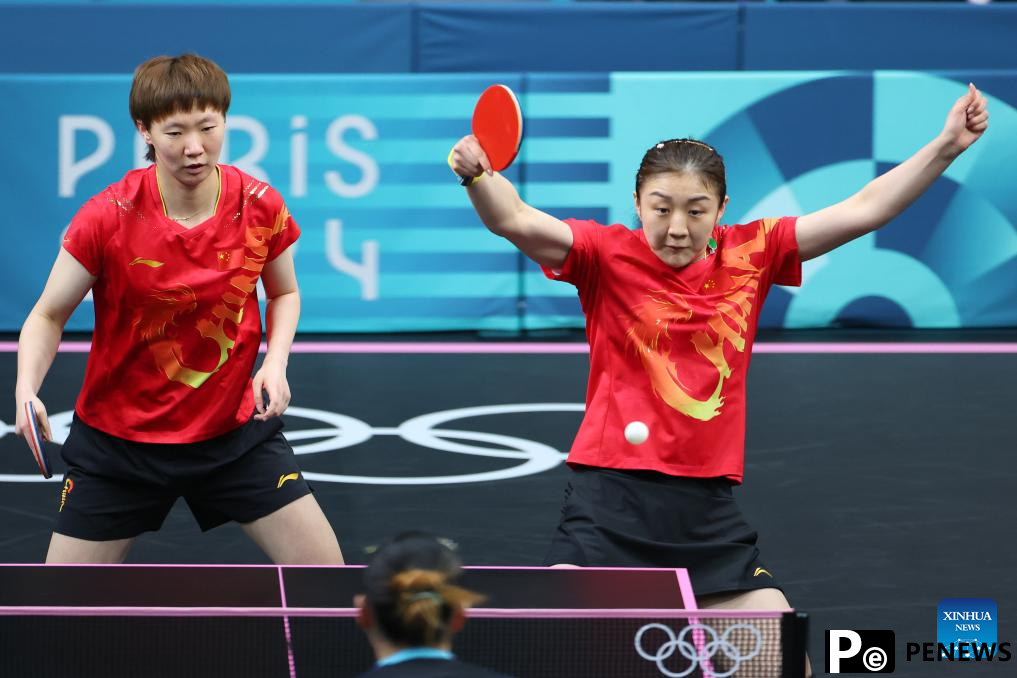 Chinese paddlers move into men