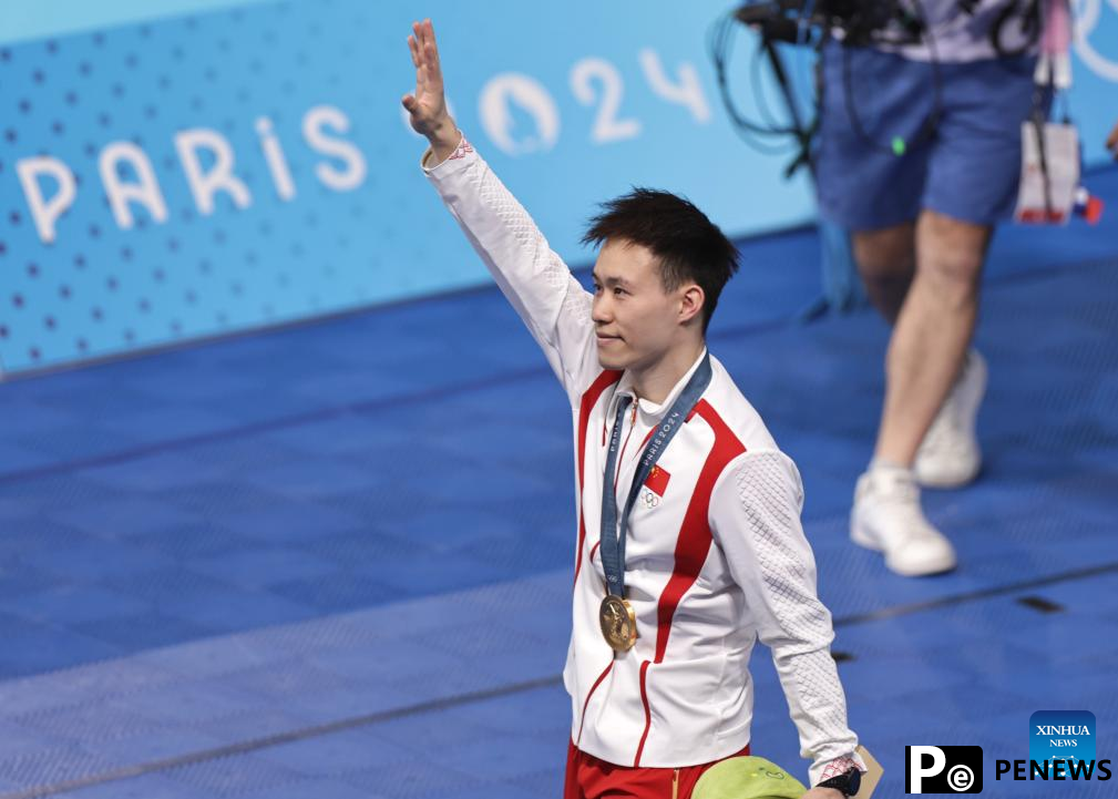 Day 13: Chinese diver defends Olympic title, weightlifting debutant claims gold