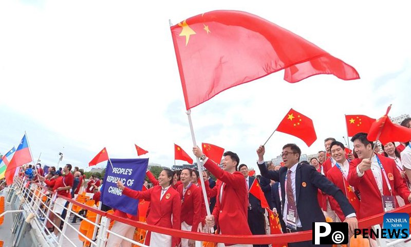 Team China showcases confidence, friendship, unity at Paris Olympics