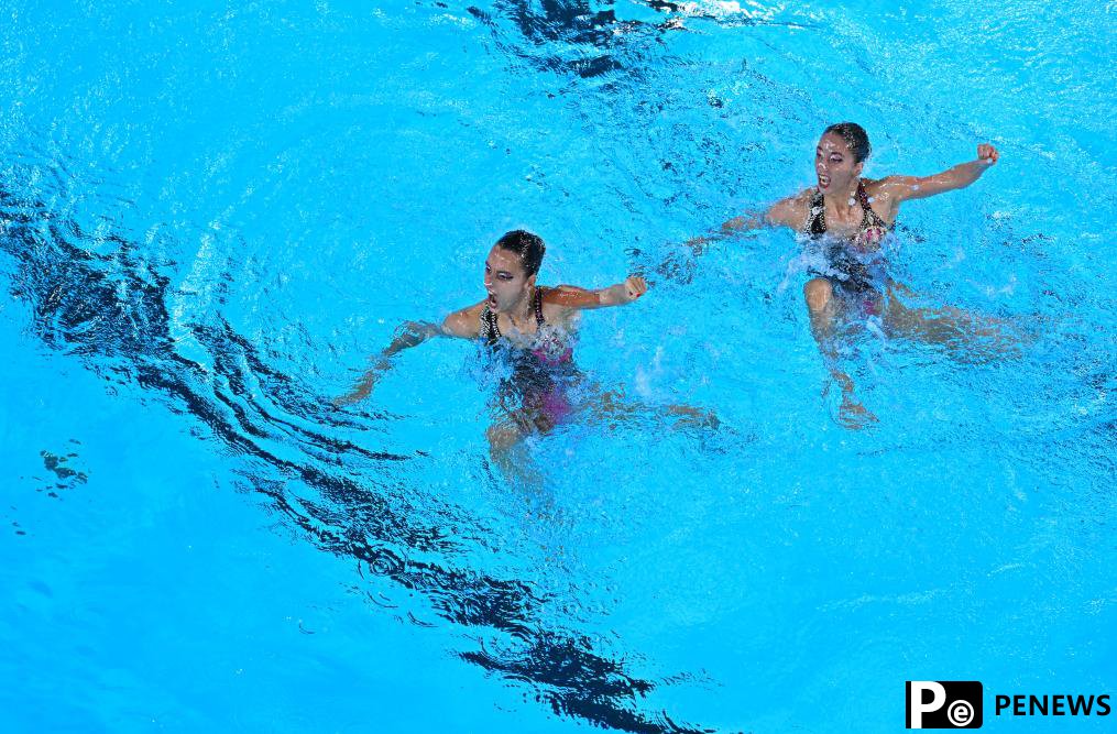 Chinese twin sisters lead duet technical in artistic swimming