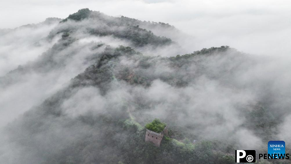 Scenery of Great Wall shrouded in clouds in Hebei