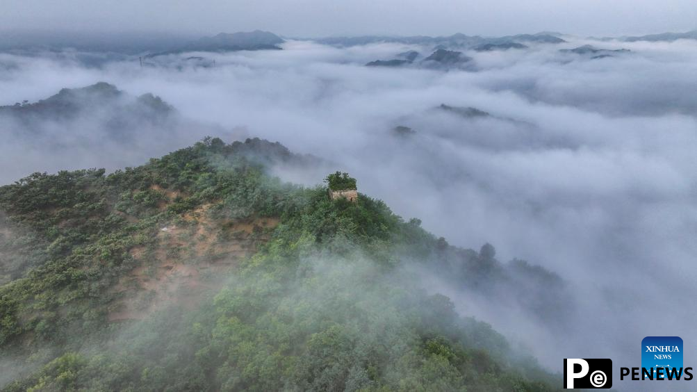 Scenery of Great Wall shrouded in clouds in Hebei