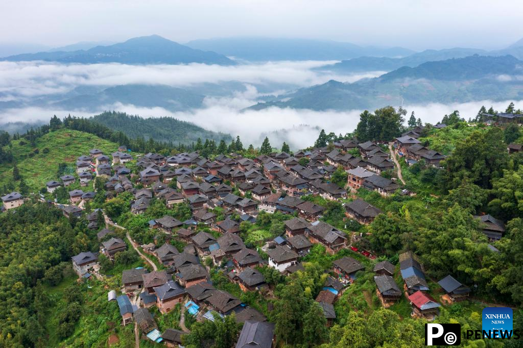 In pics: beautiful scenery, joyful life in Basha Village, SW China