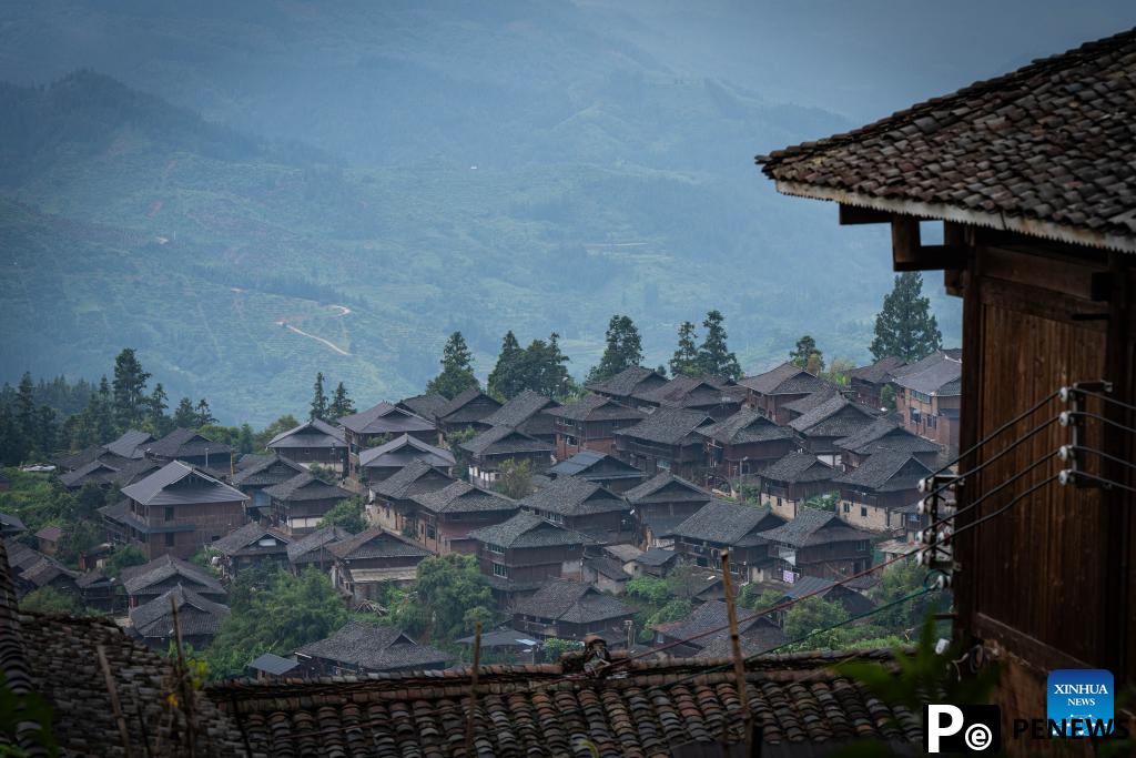 In pics: beautiful scenery, joyful life in Basha Village, SW China