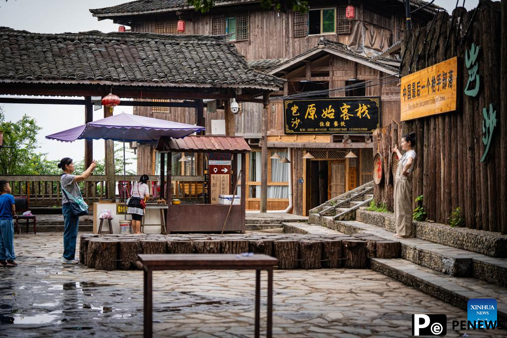 In pics: beautiful scenery, joyful life in Basha Village, SW China