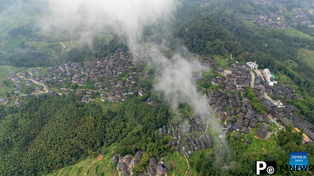 In pics: beautiful scenery, joyful life in Basha Village, SW China