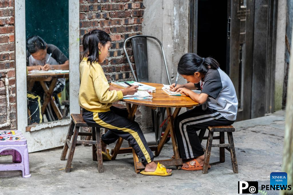 In pics: beautiful scenery, joyful life in Basha Village, SW China