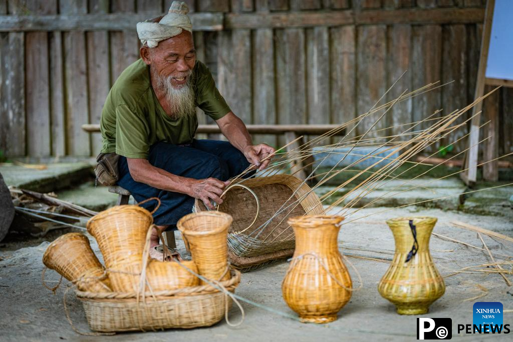In pics: beautiful scenery, joyful life in Basha Village, SW China