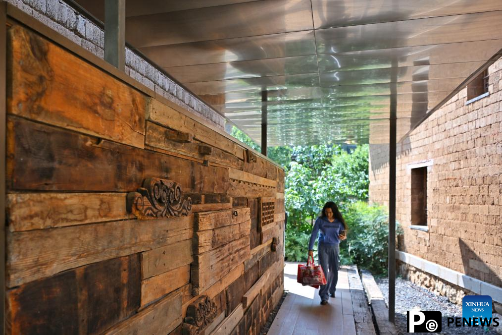 Wolong ancient village showcases restoration and ecotourism efforts in Yunnan