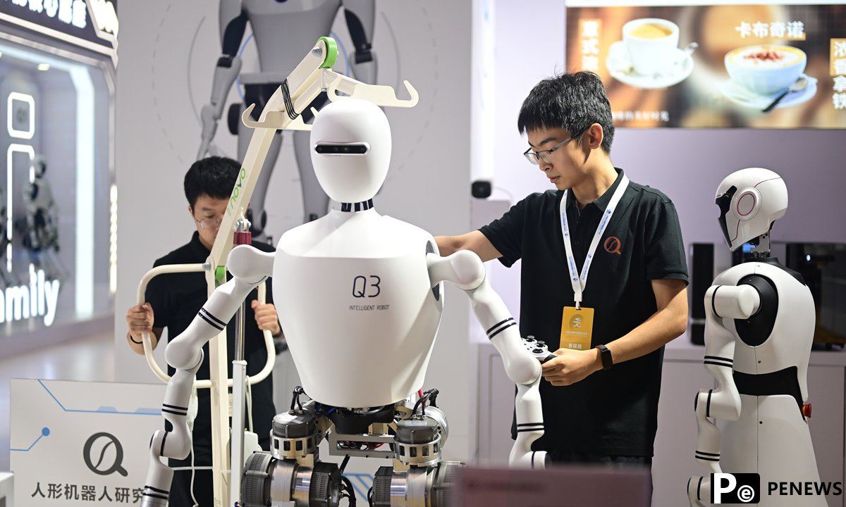 watching display at World Robot Conference in Beijing, showcasing China’s cutting