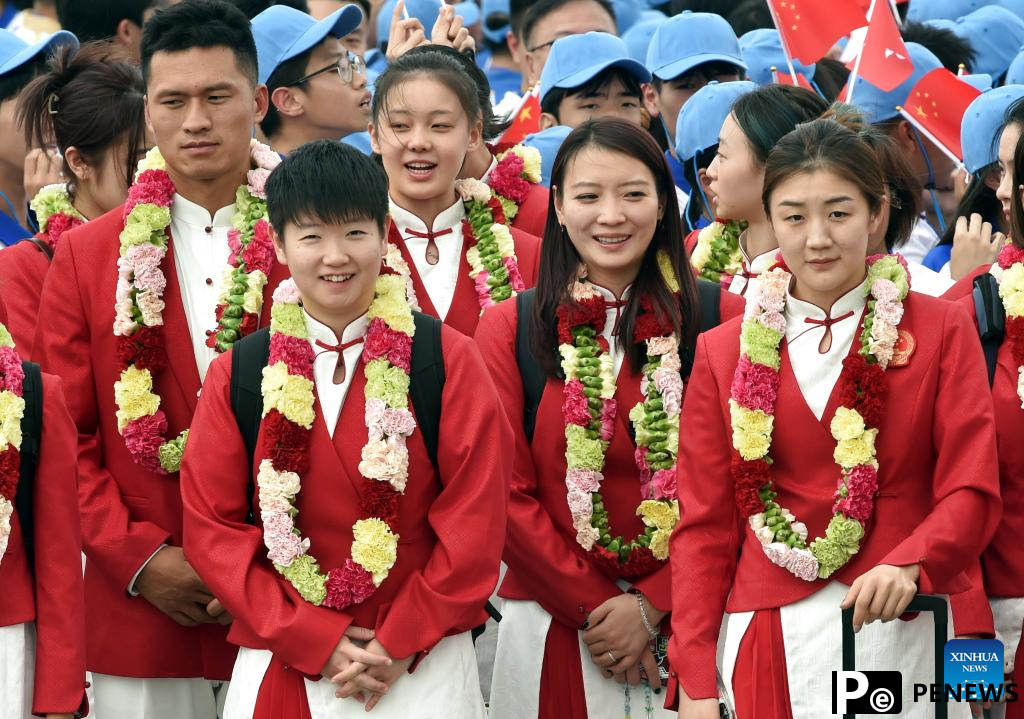Chinese Olympic champions arrive in Hong Kong for 3
