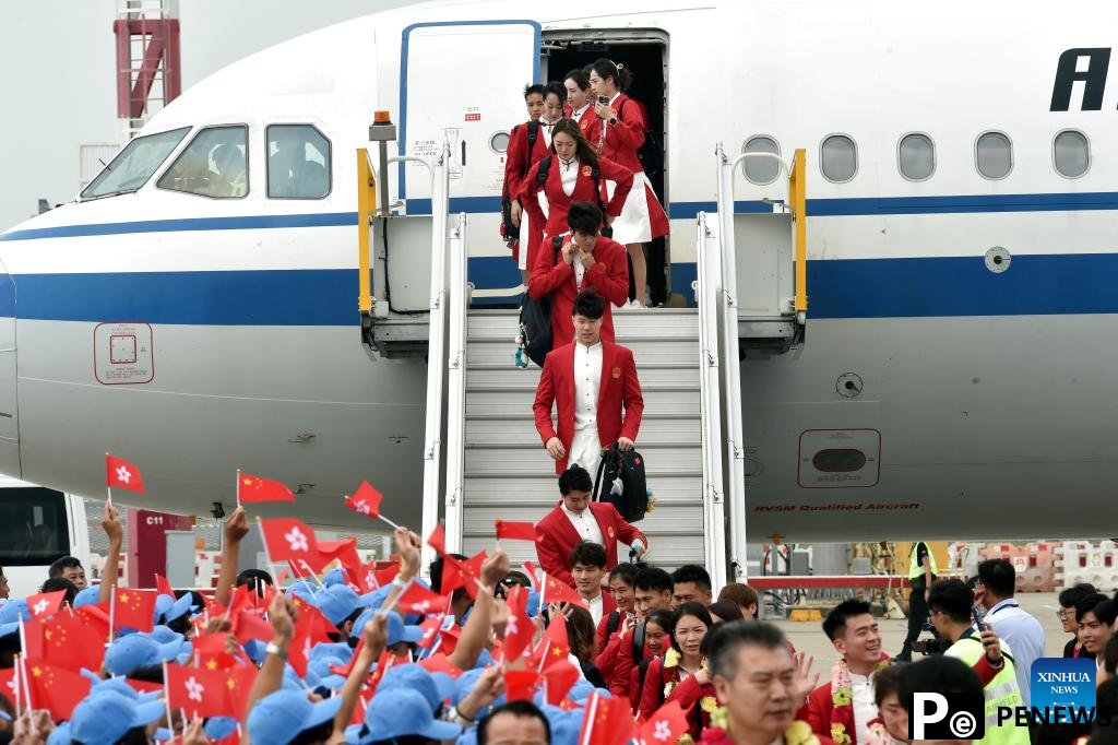 Chinese Olympic champions arrive in Hong Kong for 3