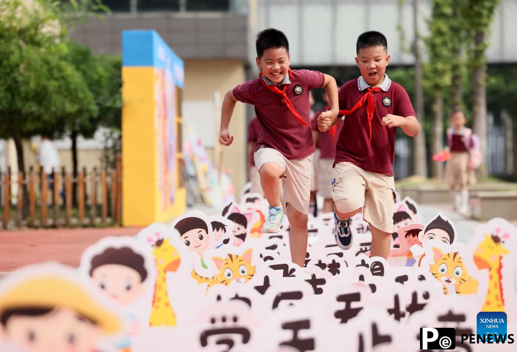 Schools across China host activities to mark start of new semester