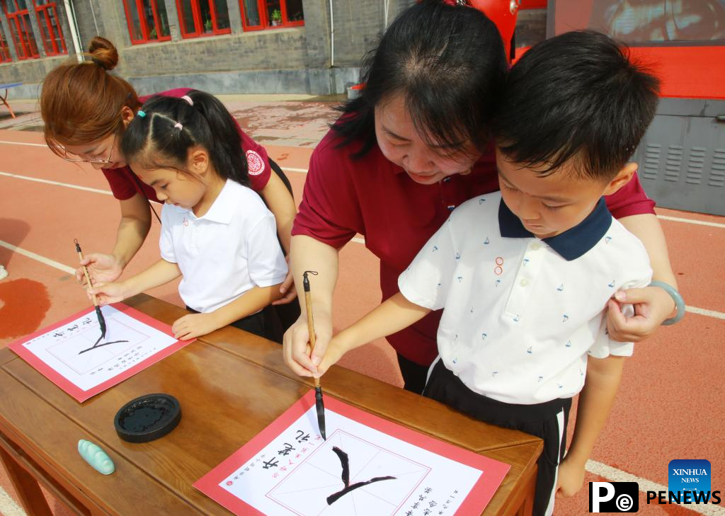Schools across China host activities to mark start of new semester