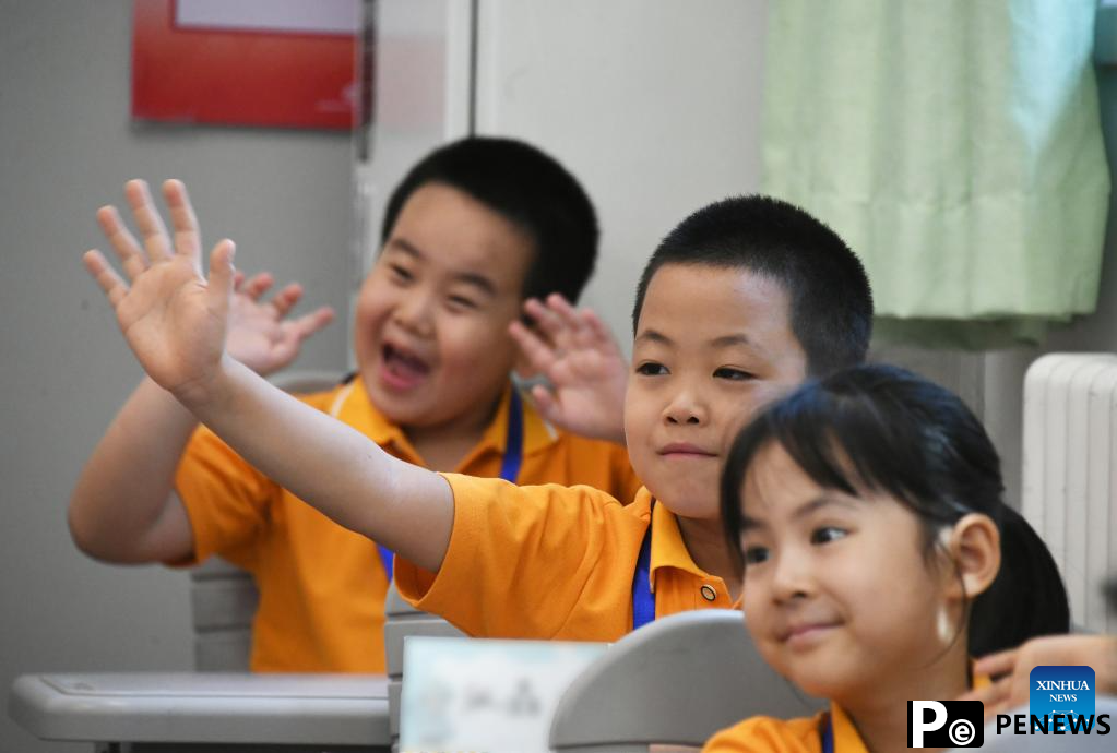 Schools across China host activities to mark start of new semester
