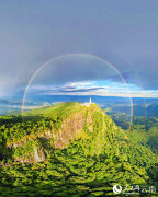 Double rainbow dazzles over Jizu Mountain in SW China's Yunnan