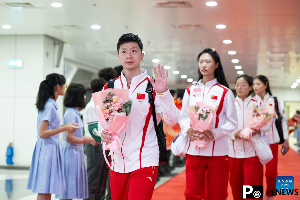 Chinese Olympic champions arrive in Macao for 3