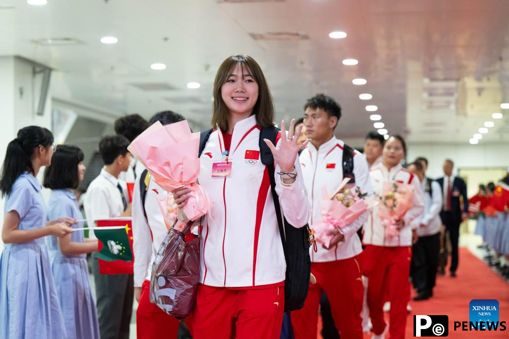Chinese Olympic champions arrive in Macao for 3