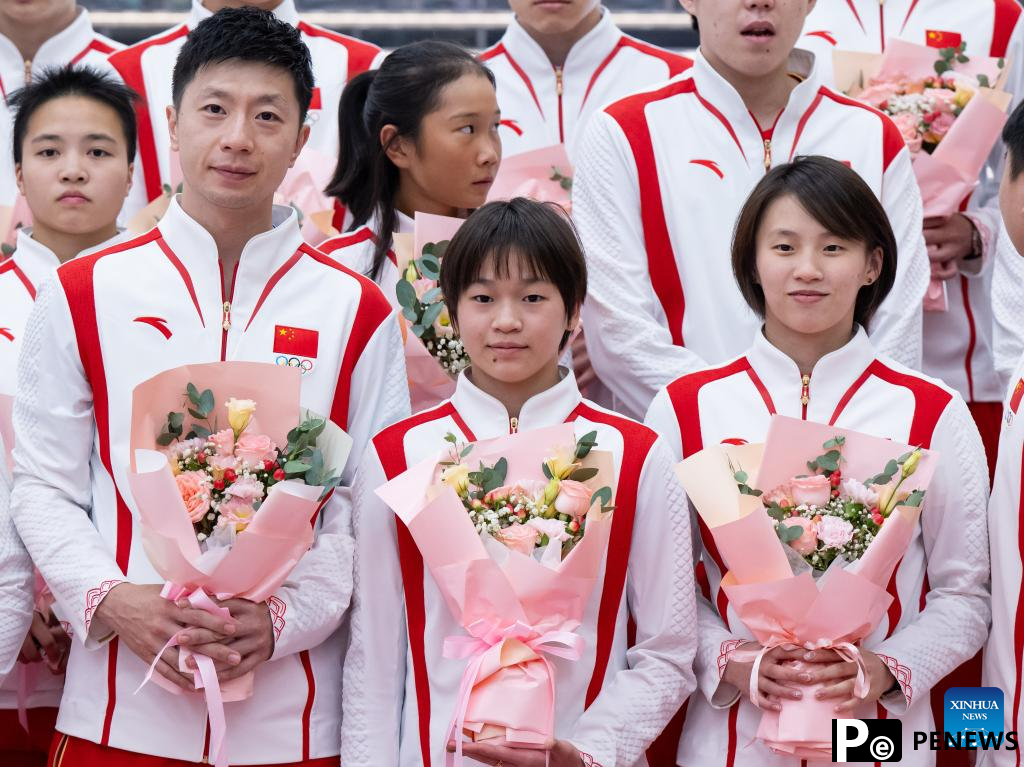 Chinese Olympic champions arrive in Macao for 3