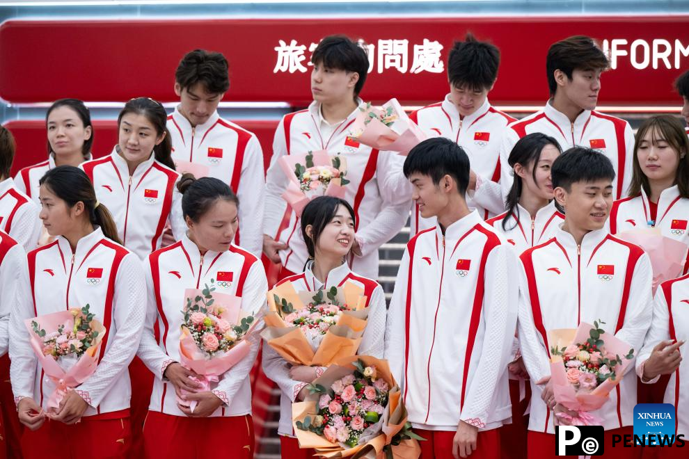 Chinese Olympic champions arrive in Macao for 3
