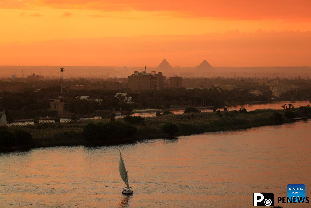 Sunset view of Giza Pyramids in Cairo