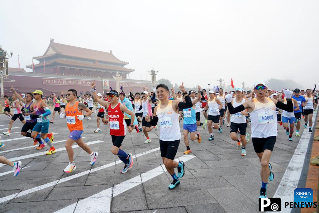 Runners attend Beijing Marathon 2024