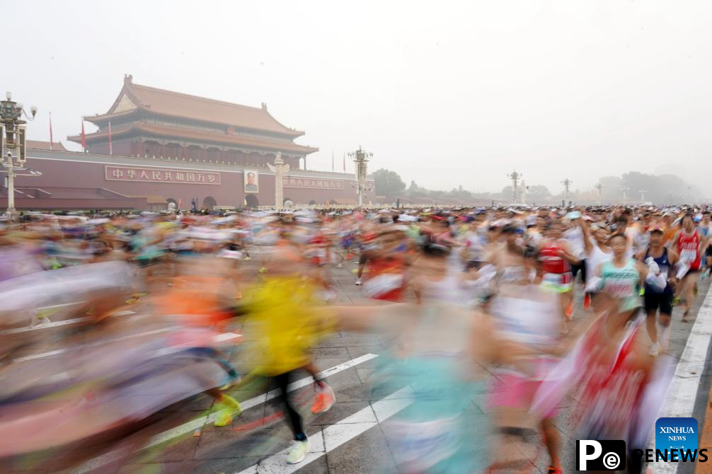 Runners attend Beijing Marathon 2024