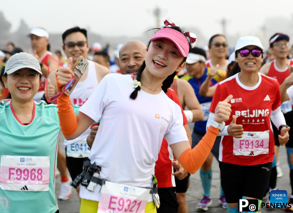 Runners attend Beijing Marathon 2024