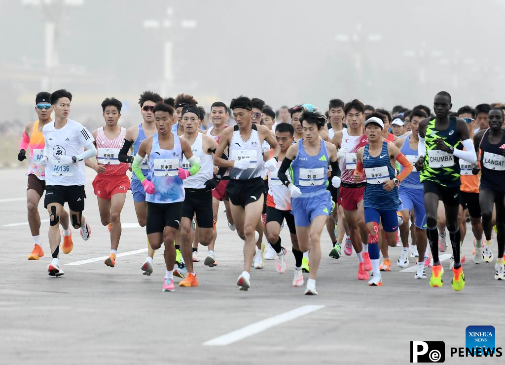 Runners attend Beijing Marathon 2024