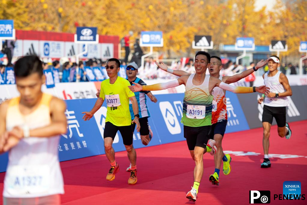 Runners attend Beijing Marathon 2024