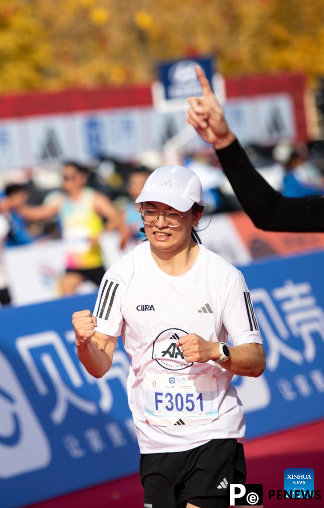 Runners attend Beijing Marathon 2024