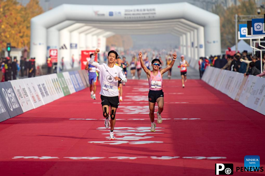 Runners attend Beijing Marathon 2024