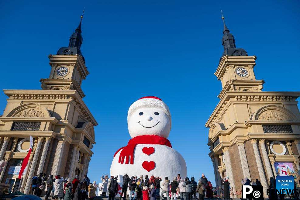In pics: giant snowman in China